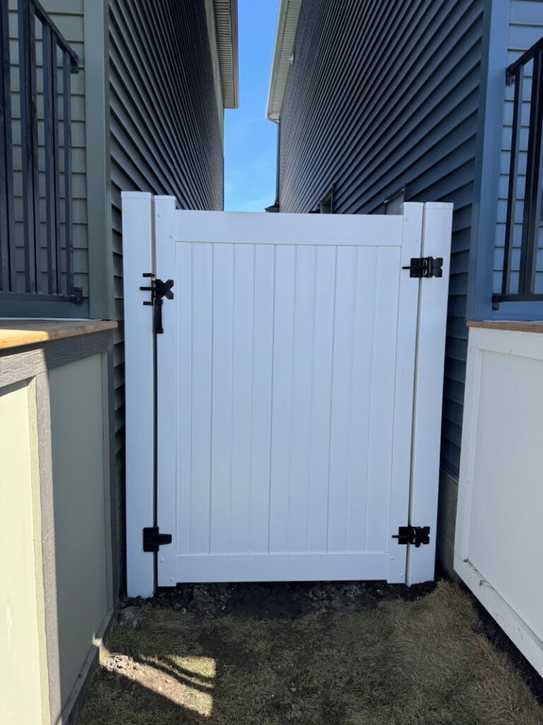 Small white fence sunny day 768x1024